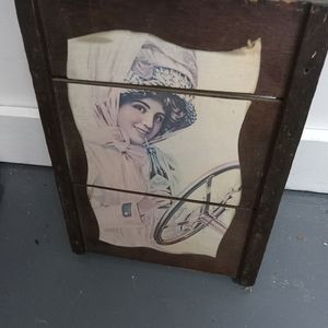 Woman drinking Coca-Cola sign